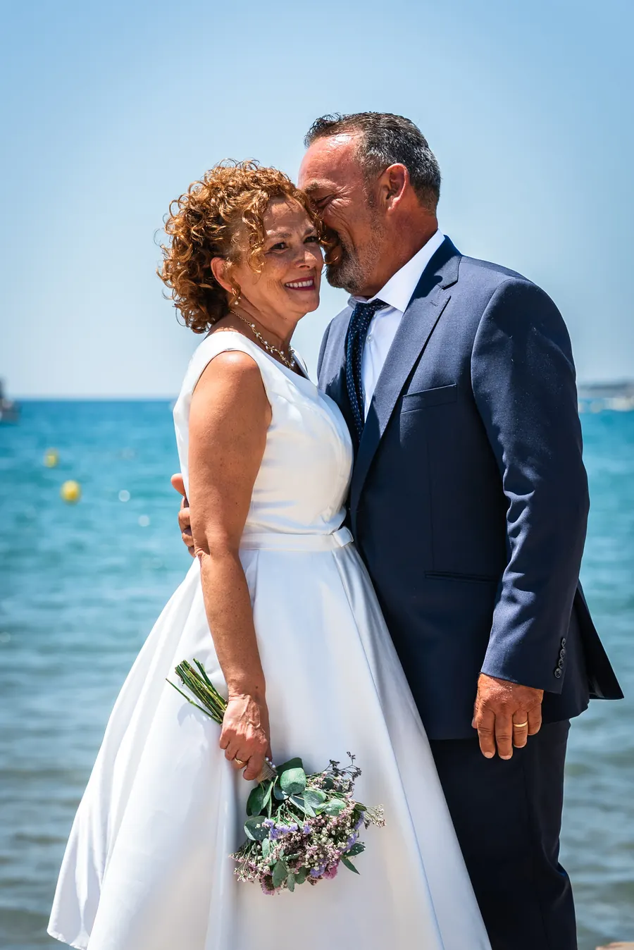 A couple on the beach at Roda de Berà